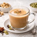 چای کرک روی میز سفید در کنار ادویه جات مختلف